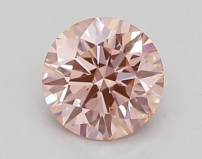 Loose Diamond - ROUND 0.53ct Fancy Vivid Pink VVS2: Loose Diamond - ROUND 0.53ct Fancy Vivid Pink VVS2 Source: This is a real non-mined Diamond that has been grown in a lab Shape: ROUND Carats: 0.53 Color: Fancy Vivid Pink Certification: IGI Video: