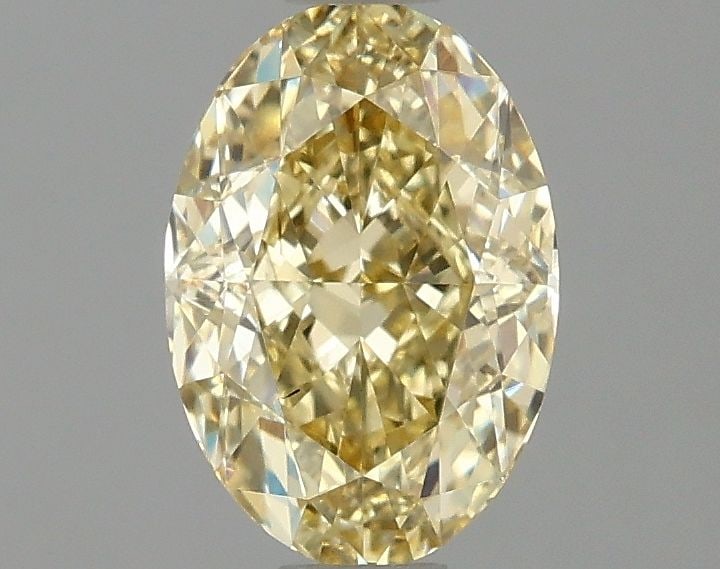Loose Diamond - OVAL 1.05ct Fancy Intense Yellow VS2: Loose Diamond - OVAL 1.05ct Fancy Intense Yellow VS2 Source: This is a real non-mined Diamond that has been grown in a lab Shape: OVAL Carats: 1.05 Color: Fancy Intense Yellow Certification: IGI Video