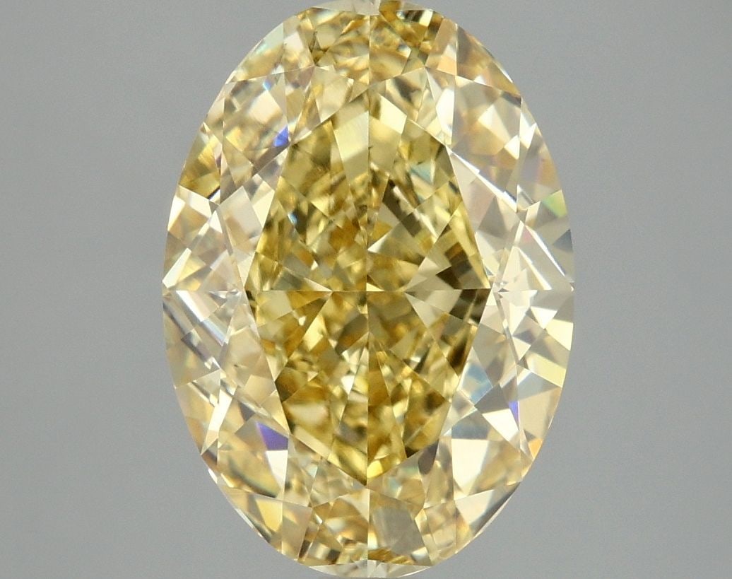 Loose Diamond - OVAL 4.95ct Fancy Vivid Yellow VS2: Loose Diamond - OVAL 4.95ct Fancy Vivid Yellow VS2 Source: This is a real non-mined Diamond that has been grown in a lab Shape: OVAL Carats: 4.95 Color: Fancy Vivid Yellow Certification: IGI Video: