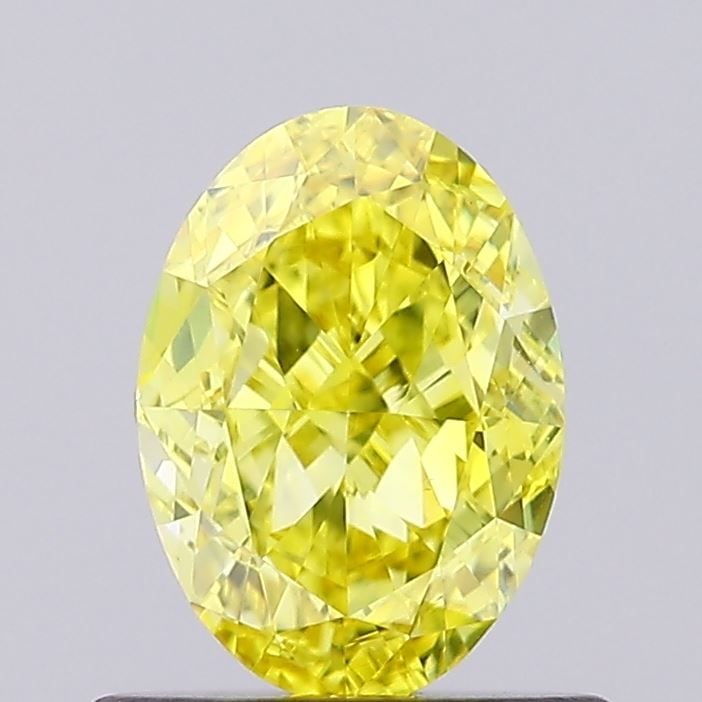 Loose Diamond - OVAL 0.8ct Fancy Vivid Yellow VS1: Loose Diamond - OVAL 0.8ct Fancy Vivid Yellow VS1 Source: This is a real non-mined Diamond that has been grown in a lab Shape: OVAL Carats: 0.8 Color: Fancy Vivid Yellow Certification: NONE Video: