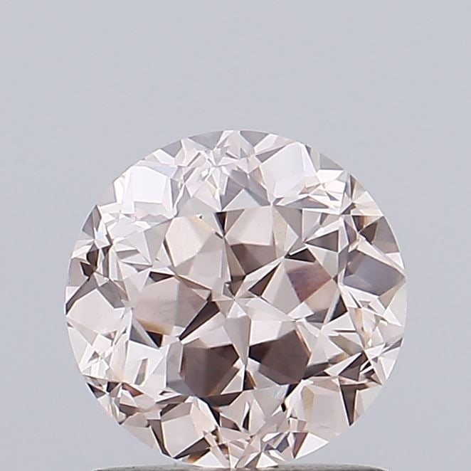 Loose Diamond - ROUND 1.24ct Fancy Light Pink VVS2: Loose Diamond - ROUND 1.24ct Fancy Light Pink VVS2 Source: This is a real non-mined Diamond that has been grown in a lab Shape: ROUND Carats: 1.24 Color: Fancy Light Pink Certification: IGI Video: