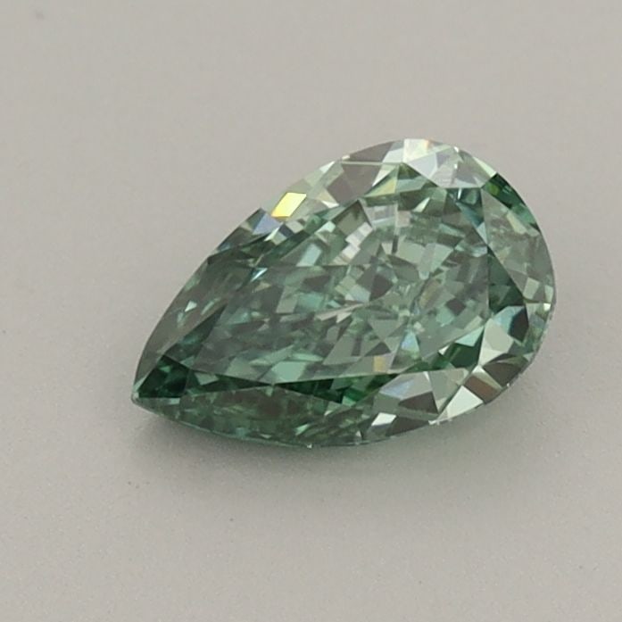 Loose Diamond - PEAR 0.58ct Fancy Vivid Green VVS2: Loose Diamond - PEAR 0.58ct Fancy Vivid Green VVS2 Source: This is a real non-mined Diamond that has been grown in a lab Shape: PEAR Carats: 0.58 Color: Fancy Vivid Green Certification: IGI Video: