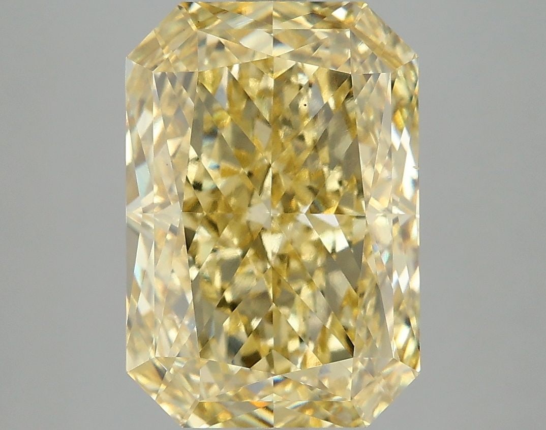 Loose Diamond - RADIANT 5.98ct Fancy Vivid Yellow VS1: Loose Diamond - RADIANT 5.98ct Fancy Vivid Yellow VS1 Source: This is a real non-mined Diamond that has been grown in a lab Shape: RADIANT Carats: 5.98 Color: Fancy Vivid Yellow Certification: IGI Vid