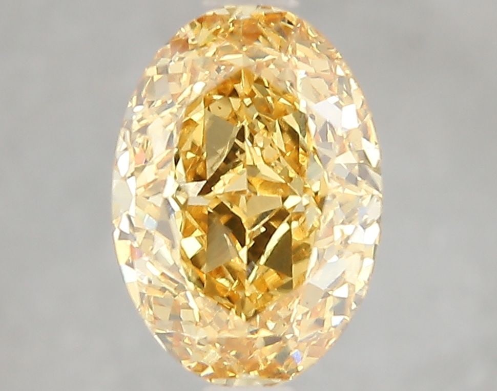 Loose Diamond - OVAL 3.1ct Fancy Vivid Yellow VS1: Loose Diamond - OVAL 3.1ct Fancy Vivid Yellow VS1 Source: This is a real non-mined Diamond that has been grown in a lab Shape: OVAL Carats: 3.1 Color: Fancy Vivid Yellow Certification: IGI Video: