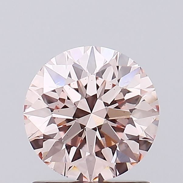 Ideal Loose Diamond - ROUND 1.13ct Fancy Pink VS2: Ideal Loose Diamond - ROUND 1.13ct Fancy Pink VS2 Source: This is a real non-mined Diamond that has been grown in a lab Shape: ROUND Carats: 1.13 Color: Fancy Pink Certification: IGI Video: