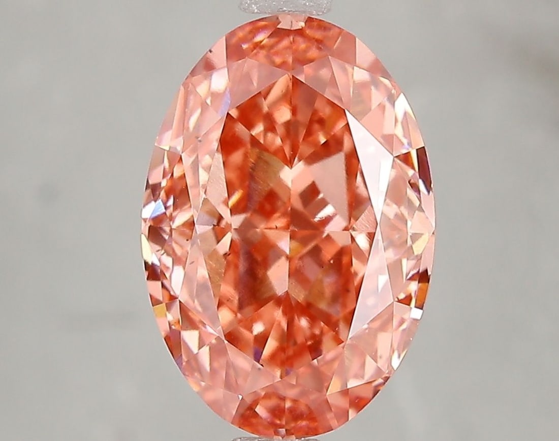 Loose Diamond - OVAL 4.58ct Fancy Vivid Pink VS2: Loose Diamond - OVAL 4.58ct Fancy Vivid Pink VS2 Source: This is a real non-mined Diamond that has been grown in a lab Shape: OVAL Carats: 4.58 Color: Fancy Vivid Pink Certification: IGI Video: