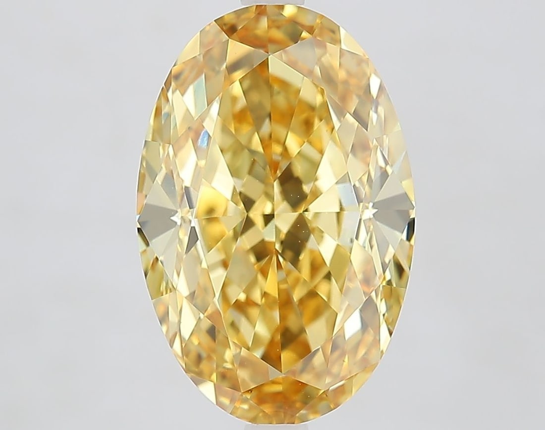 Loose Diamond - OVAL 7.07ct Fancy Vivid Yellow VVS2: Loose Diamond - OVAL 7.07ct Fancy Vivid Yellow VVS2 Source: This is a real non-mined Diamond that has been grown in a lab Shape: OVAL Carats: 7.07 Color: Fancy Vivid Yellow Certification: IGI Video: