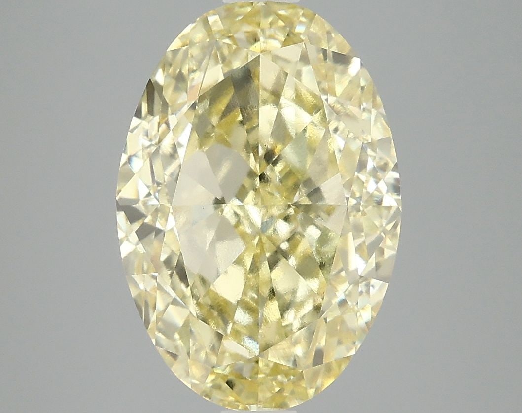Loose Diamond - OVAL 5.09ct Fancy Intense Yellow VS1: Loose Diamond - OVAL 5.09ct Fancy Intense Yellow VS1 Source: This is a real non-mined Diamond that has been grown in a lab Shape: OVAL Carats: 5.09 Color: Fancy Intense Yellow Certification: IGI