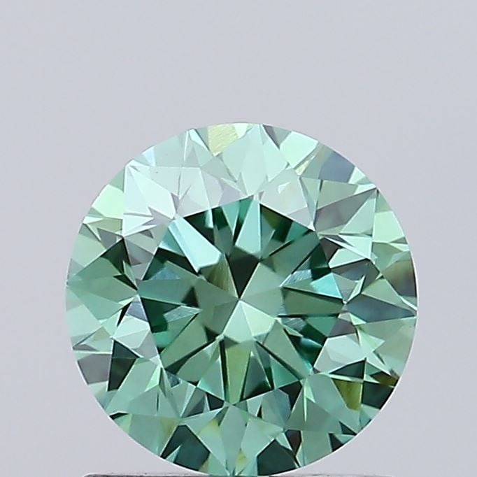 Loose Diamond - ROUND 0.91ct Fancy Vivid Green VVS2: Loose Diamond - ROUND 0.91ct Fancy Vivid Green VVS2 Source: This is a real non-mined Diamond that has been grown in a lab Shape: ROUND Carats: 0.91 Color: Fancy Vivid Green Certification: IGI Video: