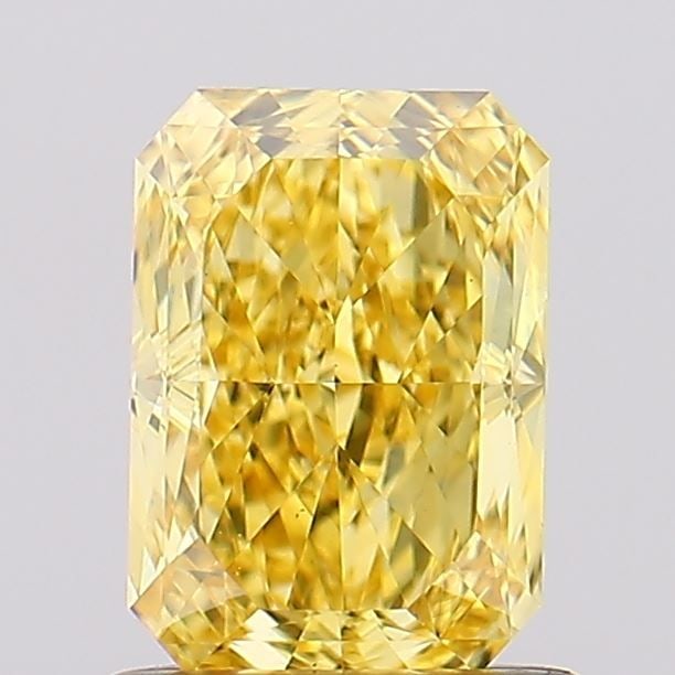 Loose Diamond - RADIANT 1.01ct Fancy Vivid Yellow VS1: Loose Diamond - RADIANT 1.01ct Fancy Vivid Yellow VS1 Source: This is a real non-mined Diamond that has been grown in a lab Shape: RADIANT Carats: 1.01 Color: Fancy Vivid Yellow Certification: IGI Vid