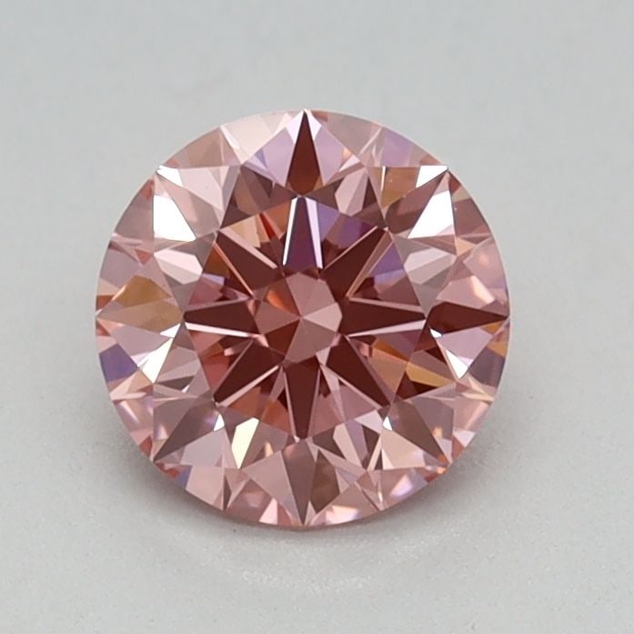 Ideal Loose Diamond - ROUND 0.6ct Fancy Vivid Pink VS1: Ideal Loose Diamond - ROUND 0.6ct Fancy Vivid Pink VS1 Source: This is a real non-mined Diamond that has been grown in a lab Shape: ROUND Carats: 0.6 Color: Fancy Vivid Pink Certification: IGI Video: