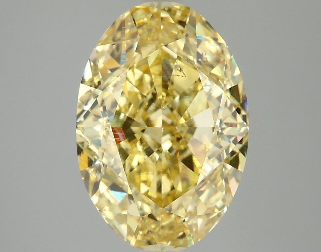 Loose Diamond - OVAL 4.1ct Fancy Vivid Yellow VS2: Loose Diamond - OVAL 4.1ct Fancy Vivid Yellow VS2 Source: This is a real non-mined Diamond that has been grown in a lab Shape: OVAL Carats: 4.1 Color: Fancy Vivid Yellow Certification: IGI Video: