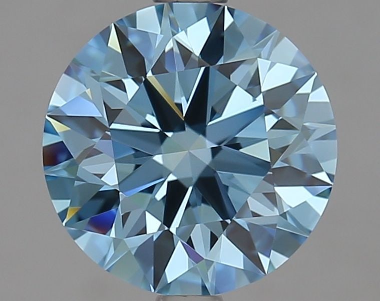 Ideal Loose Diamond - ROUND 2.3ct Fancy Vivid Blue VVS1: Ideal Loose Diamond - ROUND 2.3ct Fancy Vivid Blue VVS1 Source: This is a real non-mined Diamond that has been grown in a lab Shape: ROUND Carats: 2.3 Color: Fancy Vivid Blue Certification: IGI Video: