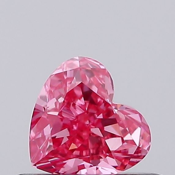 Loose Diamond - HEART 0.33ct Fancy Vivid Pink VS1: Loose Diamond - HEART 0.33ct Fancy Vivid Pink VS1 Source: This is a real non-mined Diamond that has been grown in a lab Shape: HEART Carats: 0.33 Color: Fancy Vivid Pink Certification: IGI Video: