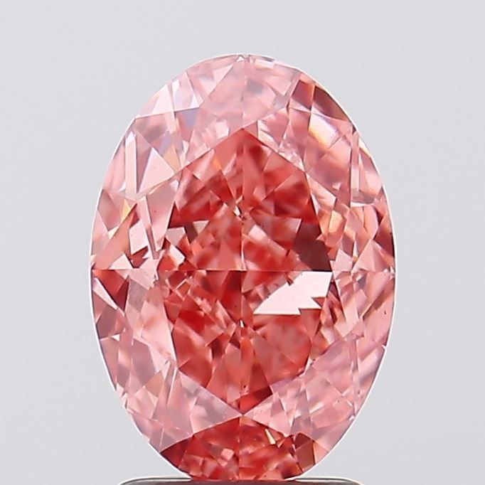Loose Diamond - OVAL 2.71ct Fancy Vivid Pink VS2: Loose Diamond - OVAL 2.71ct Fancy Vivid Pink VS2 Source: This is a real non-mined Diamond that has been grown in a lab Shape: OVAL Carats: 2.71 Color: Fancy Vivid Pink Certification: IGI Video: