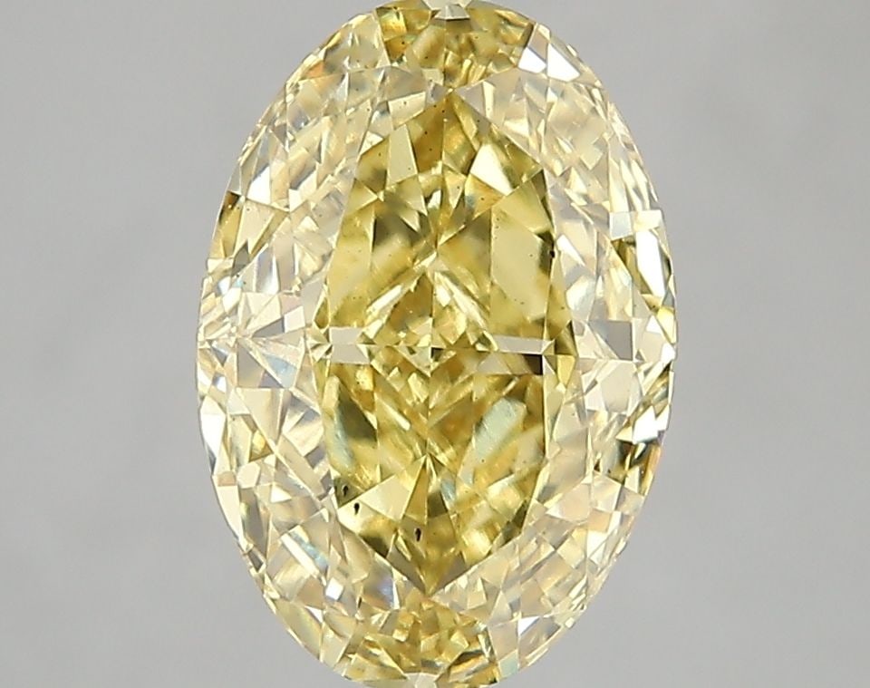 Loose Diamond - OVAL 3.08ct Fancy Vivid Yellow VS2: Loose Diamond - OVAL 3.08ct Fancy Vivid Yellow VS2 Source: This is a real non-mined Diamond that has been grown in a lab Shape: OVAL Carats: 3.08 Color: Fancy Vivid Yellow Certification: IGI Video: