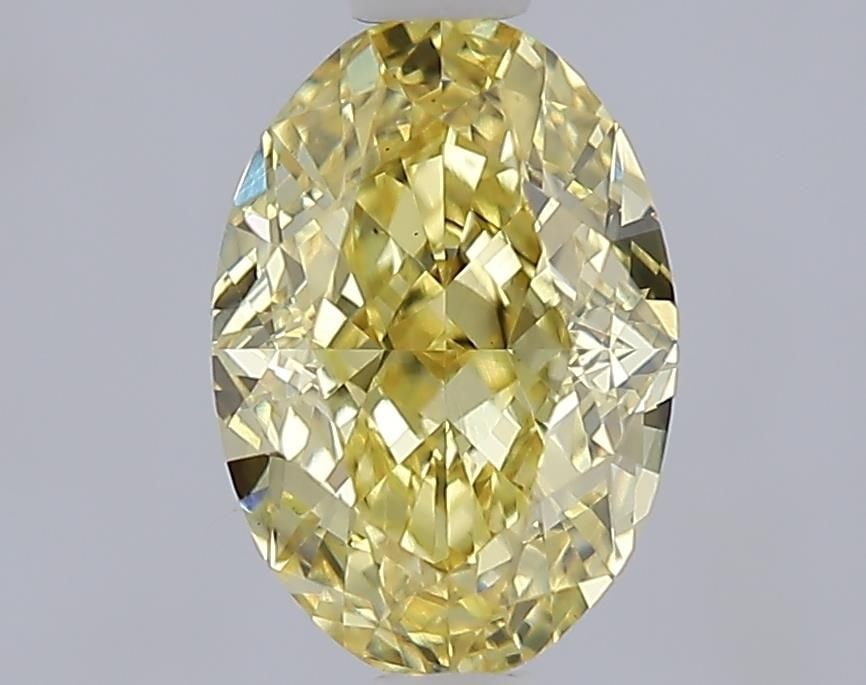 Loose Diamond - OVAL 1.55ct Fancy Intense Yellow VS1: Loose Diamond - OVAL 1.55ct Fancy Intense Yellow VS1 Source: This is a real non-mined Diamond that has been grown in a lab Shape: OVAL Carats: 1.55 Color: Fancy Intense Yellow Certification: IGI Video