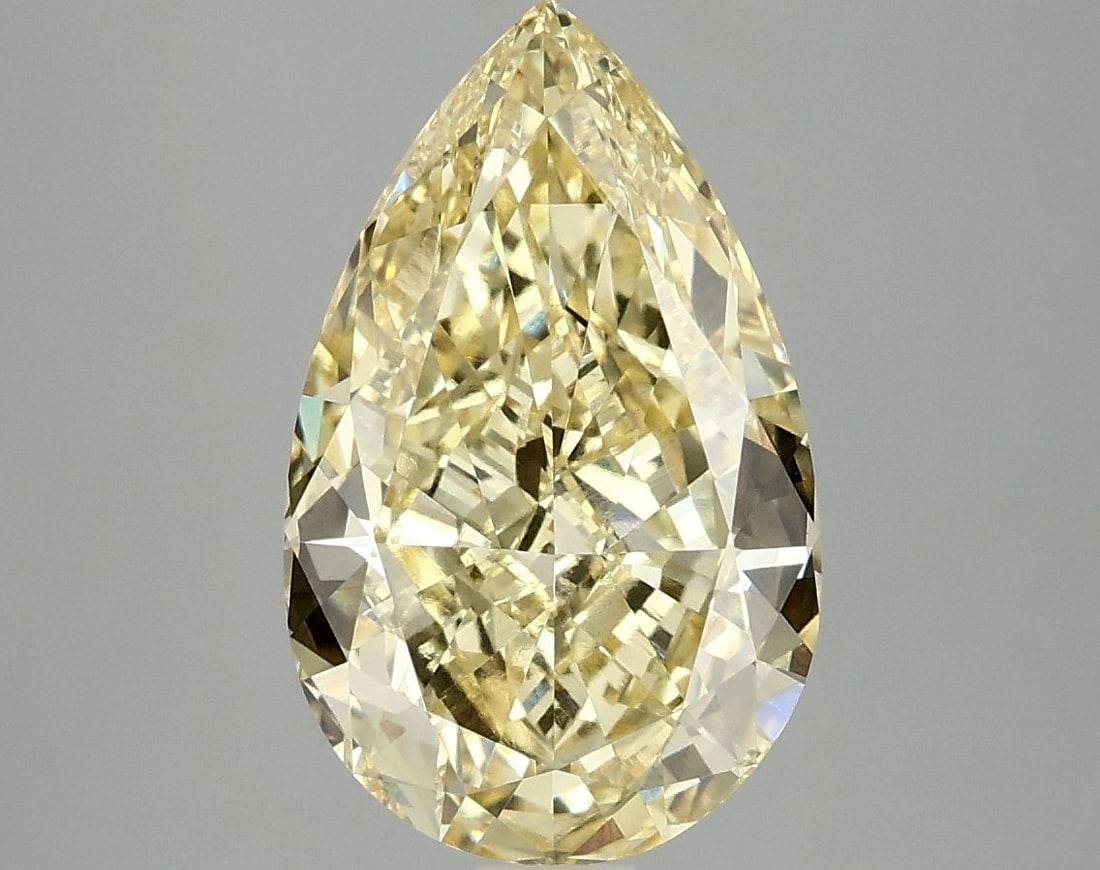 Loose Diamond - PEAR 4.04ct Fancy Vivid Yellow VS1: Loose Diamond - PEAR 4.04ct Fancy Vivid Yellow VS1 Source: This is a real non-mined Diamond that has been grown in a lab Shape: PEAR Carats: 4.04 Color: Fancy Vivid Yellow Certification: IGI Video:
