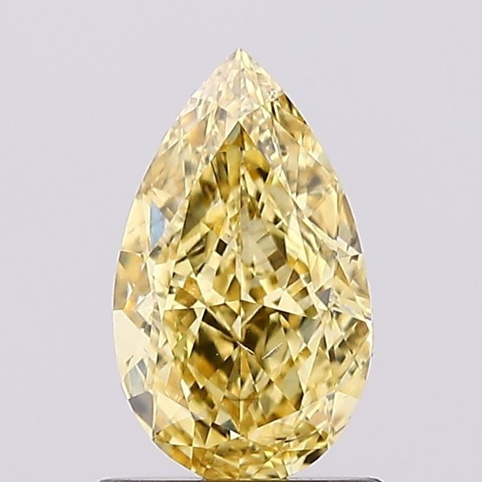 Loose Diamond - PEAR 1.04ct Fancy Vivid Yellow SI1: Loose Diamond - PEAR 1.04ct Fancy Vivid Yellow SI1 Source: This is a real non-mined Diamond that has been grown in a lab Shape: PEAR Carats: 1.04 Color: Fancy Vivid Yellow Certification: IGI Video: