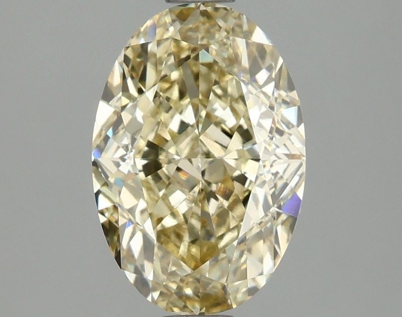 Loose Diamond - OVAL 2.09ct Fancy Yellow VS1: Loose Diamond - OVAL 2.09ct Fancy Yellow VS1 Source: This is a real non-mined Diamond that has been grown in a lab Shape: OVAL Carats: 2.09 Color: Fancy Yellow Certification: IGI Video: