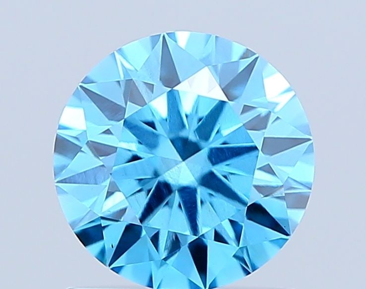 Ideal Loose Diamond - ROUND 1.04ct Fancy Vivid Blue VS2: Ideal Loose Diamond - ROUND 1.04ct Fancy Vivid Blue VS2 Source: This is a real non-mined Diamond that has been grown in a lab Shape: ROUND Carats: 1.04 Color: Fancy Vivid Blue Certification: IGI Video
