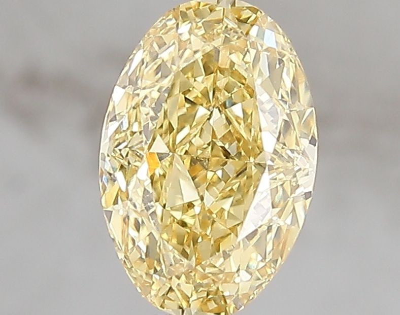 Loose Diamond - OVAL 1.52ct Fancy Vivid Yellow VVS2: Loose Diamond - OVAL 1.52ct Fancy Vivid Yellow VVS2 Source: This is a real non-mined Diamond that has been grown in a lab Shape: OVAL Carats: 1.52 Color: Fancy Vivid Yellow Certification: IGI Video: