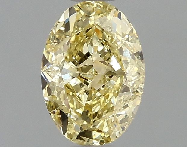 Loose Diamond - OVAL 1.02ct Fancy Intense Yellow VVS2: Loose Diamond - OVAL 1.02ct Fancy Intense Yellow VVS2 Source: This is a real non-mined Diamond that has been grown in a lab Shape: OVAL Carats: 1.02 Color: Fancy Intense Yellow Certification: IGI Vide