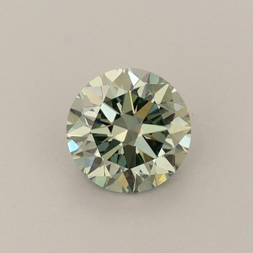 Loose Diamond - ROUND 0.75ct Fancy Vivid Green VS1: Loose Diamond - ROUND 0.75ct Fancy Vivid Green VS1 Source: This is a real non-mined Diamond that has been grown in a lab Shape: ROUND Carats: 0.75 Color: Fancy Vivid Green Certification: IGI Video: