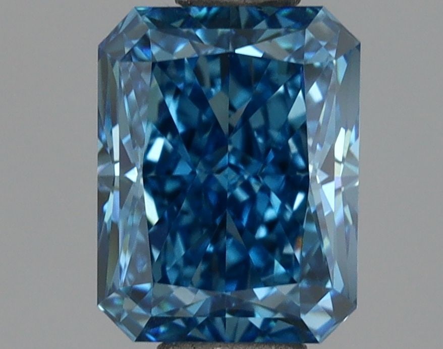 Loose Diamond - RADIANT 1.27ct Fancy Vivid Blue VVS2: Loose Diamond - RADIANT 1.27ct Fancy Vivid Blue VVS2 Source: This is a real non-mined Diamond that has been grown in a lab Shape: RADIANT Carats: 1.27 Color: Fancy Vivid Blue Certification: IGI Video: