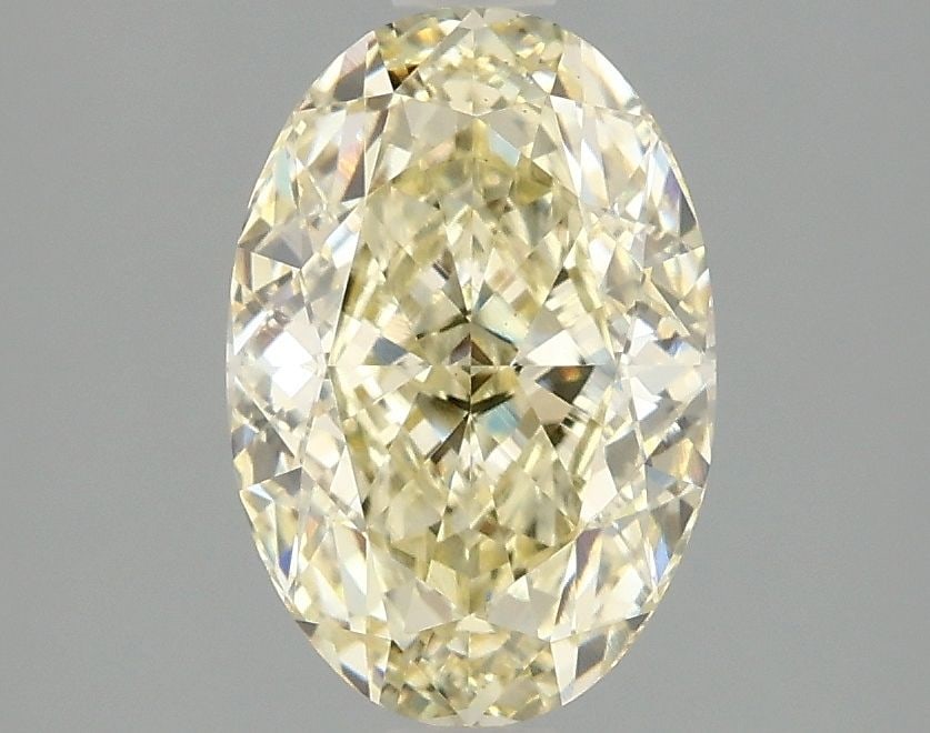 Loose Diamond - OVAL 2.1ct Fancy Yellow VS1: Loose Diamond - OVAL 2.1ct Fancy Yellow VS1 Source: This is a real non-mined Diamond that has been grown in a lab Shape: OVAL Carats: 2.1 Color: Fancy Yellow Certification: IGI Video: