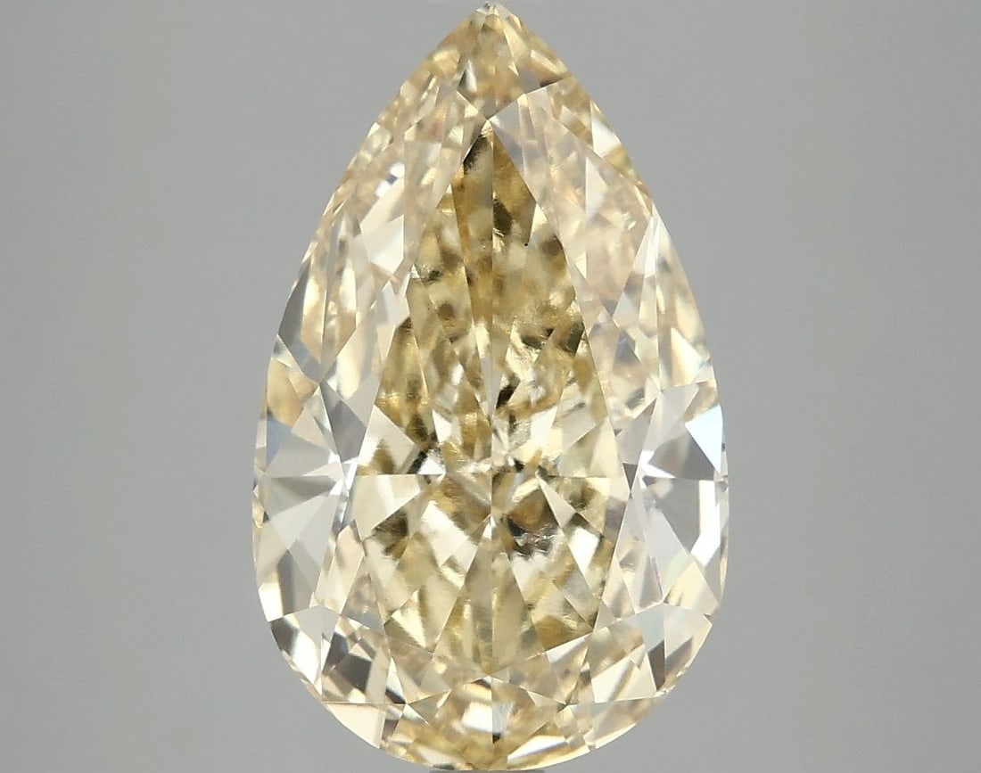 Loose Diamond - PEAR 5.09ct Fancy Vivid Yellow VS1: Loose Diamond - PEAR 5.09ct Fancy Vivid Yellow VS1 Source: This is a real non-mined Diamond that has been grown in a lab Shape: PEAR Carats: 5.09 Color: Fancy Vivid Yellow Certification: IGI Video: