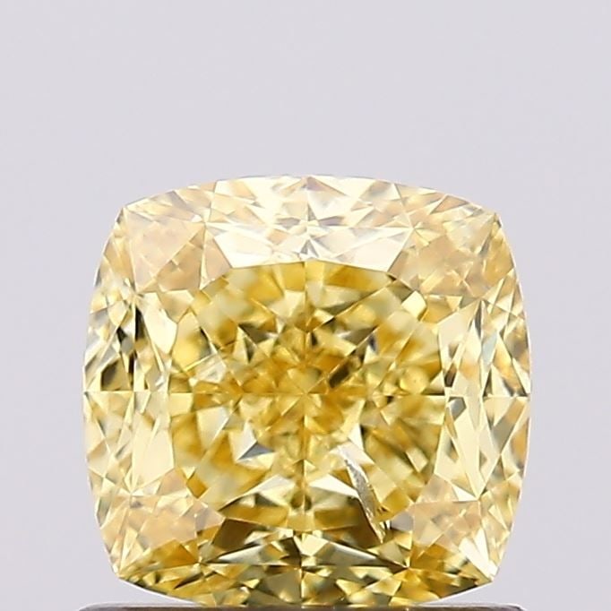 Loose Diamond - CUSHION MODIFIED 1.02ct Fancy Vivid Yellow SI2: Loose Diamond - CUSHION MODIFIED 1.02ct Fancy Vivid Yellow SI2 Source: This is a real non-mined Diamond that has been grown in a lab Shape: CUSHION MODIFIED Carats: 1.02 Color: Fancy Vivid Yellow Cert
