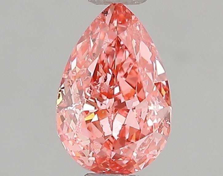 Loose Diamond - PEAR 1.0ct Fancy Vivid Pink SI1: Loose Diamond - PEAR 1.0ct Fancy Vivid Pink SI1 Source: This is a real non-mined Diamond that has been grown in a lab Shape: PEAR Carats: 1.0 Color: Fancy Vivid Pink Certification: IGI Video: