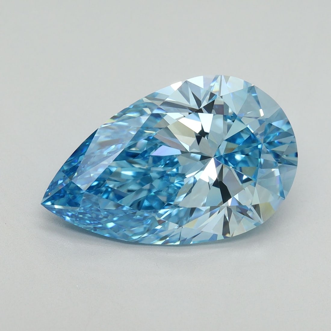 Loose Diamond - PEAR 5.07ct Fancy Vivid Blue VVS2: Loose Diamond - PEAR 5.07ct Fancy Vivid Blue VVS2 Source: This is a real non-mined Diamond that has been grown in a lab Shape: PEAR Carats: 5.07 Color: Fancy Vivid Blue Certification: IGI Video: