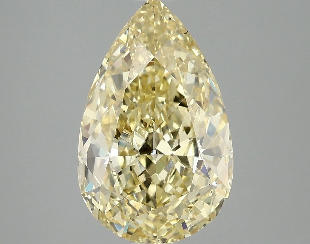 Loose Diamond - PEAR 3.1ct Fancy Vivid Yellow VS2: Loose Diamond - PEAR 3.1ct Fancy Vivid Yellow VS2 Source: This is a real non-mined Diamond that has been grown in a lab Shape: PEAR Carats: 3.1 Color: Fancy Vivid Yellow Certification: IGI Video: