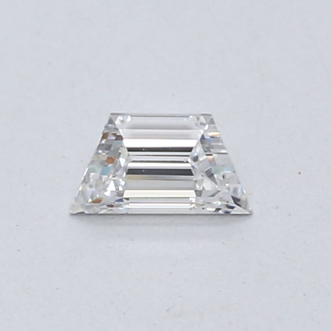 Loose Diamond - TRAPEZOID 0.38ct E VS1: Loose Diamond - TRAPEZOID 0.38ct E VS1 Source: This is a real non-mined Diamond that has been grown in a lab Shape: TRAPEZOID Carats: 0.38 Color: E Clarity: VS1 Certification: NONE Video: