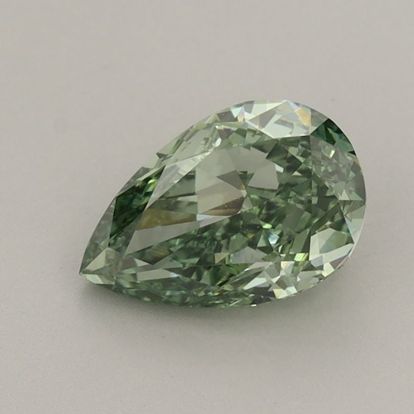 Loose Diamond - PEAR 1.32ct Fancy Vivid Green VS1: Loose Diamond - PEAR 1.32ct Fancy Vivid Green VS1 Source: This is a real non-mined Diamond that has been grown in a lab Shape: PEAR Carats: 1.32 Color: Fancy Vivid Green Certification: IGI Video: