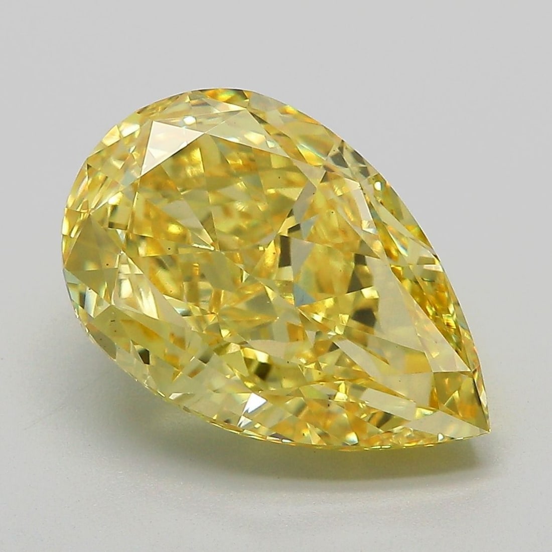 Loose Diamond - PEAR 6.01ct Fancy Vivid Yellow VS1: Loose Diamond - PEAR 6.01ct Fancy Vivid Yellow VS1 Source: This is a real non-mined Diamond that has been grown in a lab Shape: PEAR Carats: 6.01 Color: Fancy Vivid Yellow Certification: IGI Video: