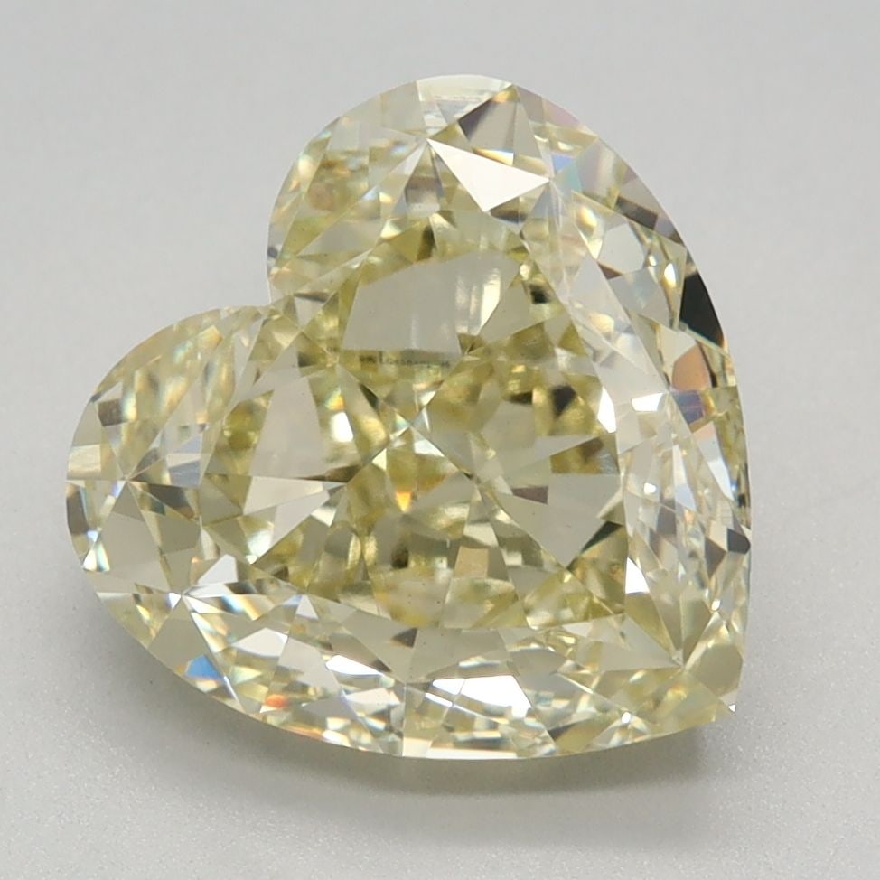 Loose Diamond - HEART 3.35ct Fancy Light Yellow VVS2: Loose Diamond - HEART 3.35ct Fancy Light Yellow VVS2 Source: This is a real non-mined Diamond that has been grown in a lab Shape: HEART Carats: 3.35 Color: Fancy Light Yellow Certification: IGI Video: