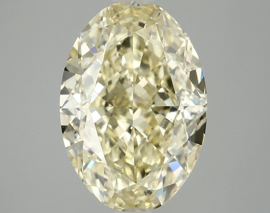 Loose Diamond - OVAL 4.05ct Fancy Vivid Yellow VS1: Loose Diamond - OVAL 4.05ct Fancy Vivid Yellow VS1 Source: This is a real non-mined Diamond that has been grown in a lab Shape: OVAL Carats: 4.05 Color: Fancy Vivid Yellow Certification: IGI Video: