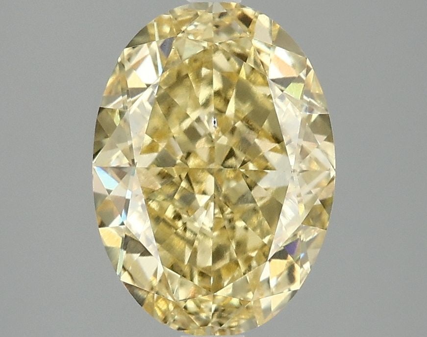 Loose Diamond - OVAL 3.04ct Fancy Vivid Yellow VS2: Loose Diamond - OVAL 3.04ct Fancy Vivid Yellow VS2 Source: This is a real non-mined Diamond that has been grown in a lab Shape: OVAL Carats: 3.04 Color: Fancy Vivid Yellow Certification: IGI Video: