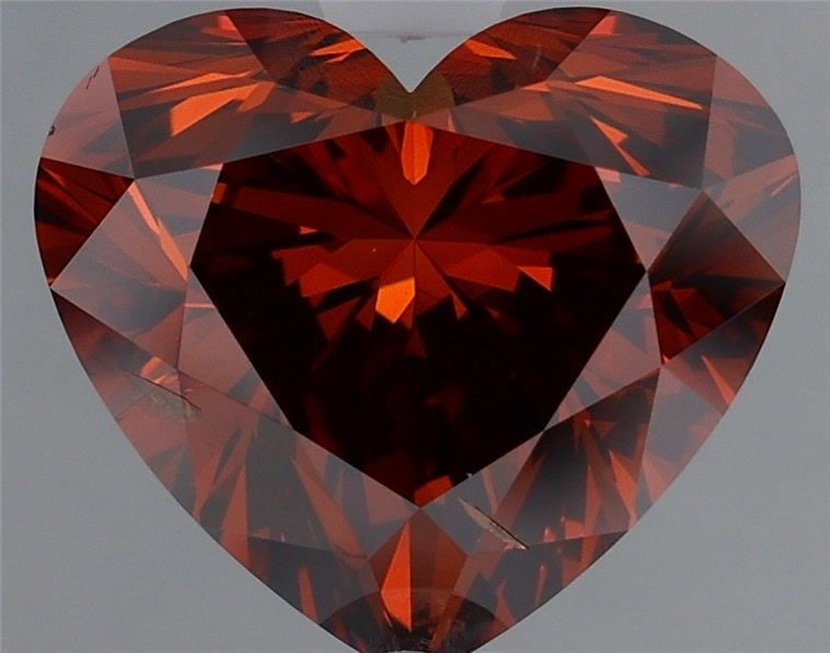 Loose Diamond - HEART 3.0ct Fancy Deep Orange VS2: Loose Diamond - HEART 3.0ct Fancy Deep Orange VS2 Source: This is a real non-mined Diamond that has been grown in a lab Shape: HEART Carats: 3.0 Color: Fancy Deep Orange Certification: IGI Video: