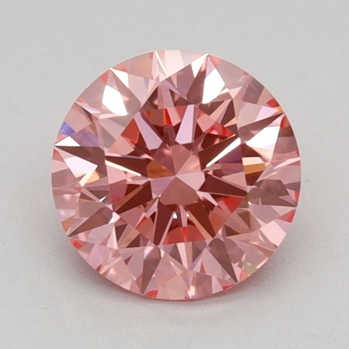 Ideal Loose Diamond - ROUND 0.77ct Fancy Vivid Pink VVS2: Ideal Loose Diamond - ROUND 0.77ct Fancy Vivid Pink VVS2 Source: This is a real non-mined Diamond that has been grown in a lab Shape: ROUND Carats: 0.77 Color: Fancy Vivid Pink Certification: IGI Vide