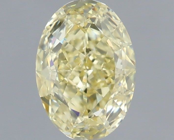 Loose Diamond - OVAL 1.06ct Fancy Yellow VVS2: Loose Diamond - OVAL 1.06ct Fancy Yellow VVS2 Source: This is a real non-mined Diamond that has been grown in a lab Shape: OVAL Carats: 1.06 Color: Fancy Yellow Certification: IGI Video: