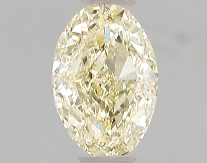 Loose Diamond - OVAL 1.0ct Fancy Yellow VS2: Loose Diamond - OVAL 1.0ct Fancy Yellow VS2 Source: This is a real non-mined Diamond that has been grown in a lab Shape: OVAL Carats: 1.0 Color: Fancy Yellow Certification: IGI Video: