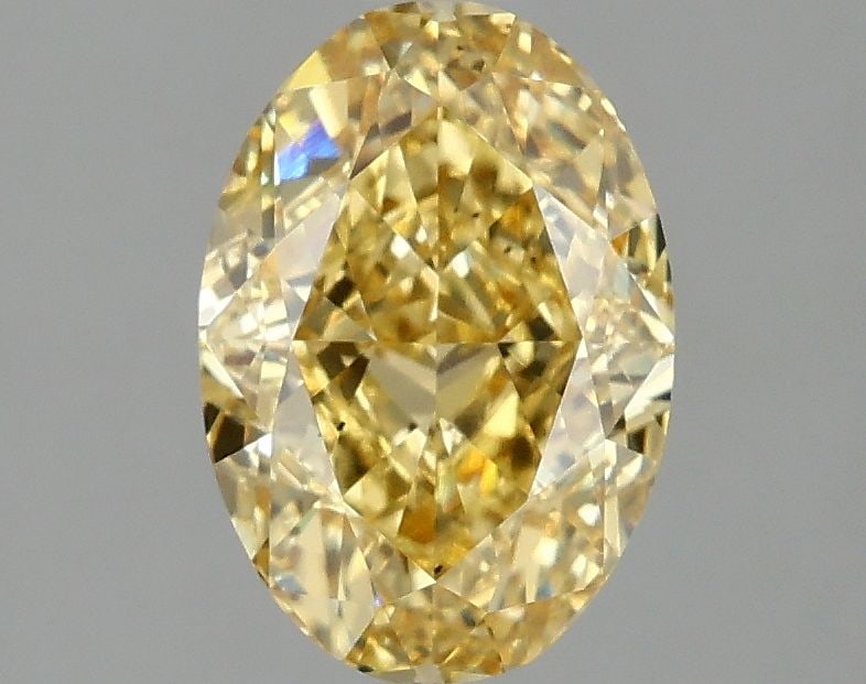 Loose Diamond - OVAL 2.02ct Fancy Vivid Yellow VS2: Loose Diamond - OVAL 2.02ct Fancy Vivid Yellow VS2 Source: This is a real non-mined Diamond that has been grown in a lab Shape: OVAL Carats: 2.02 Color: Fancy Vivid Yellow Certification: IGI Video: