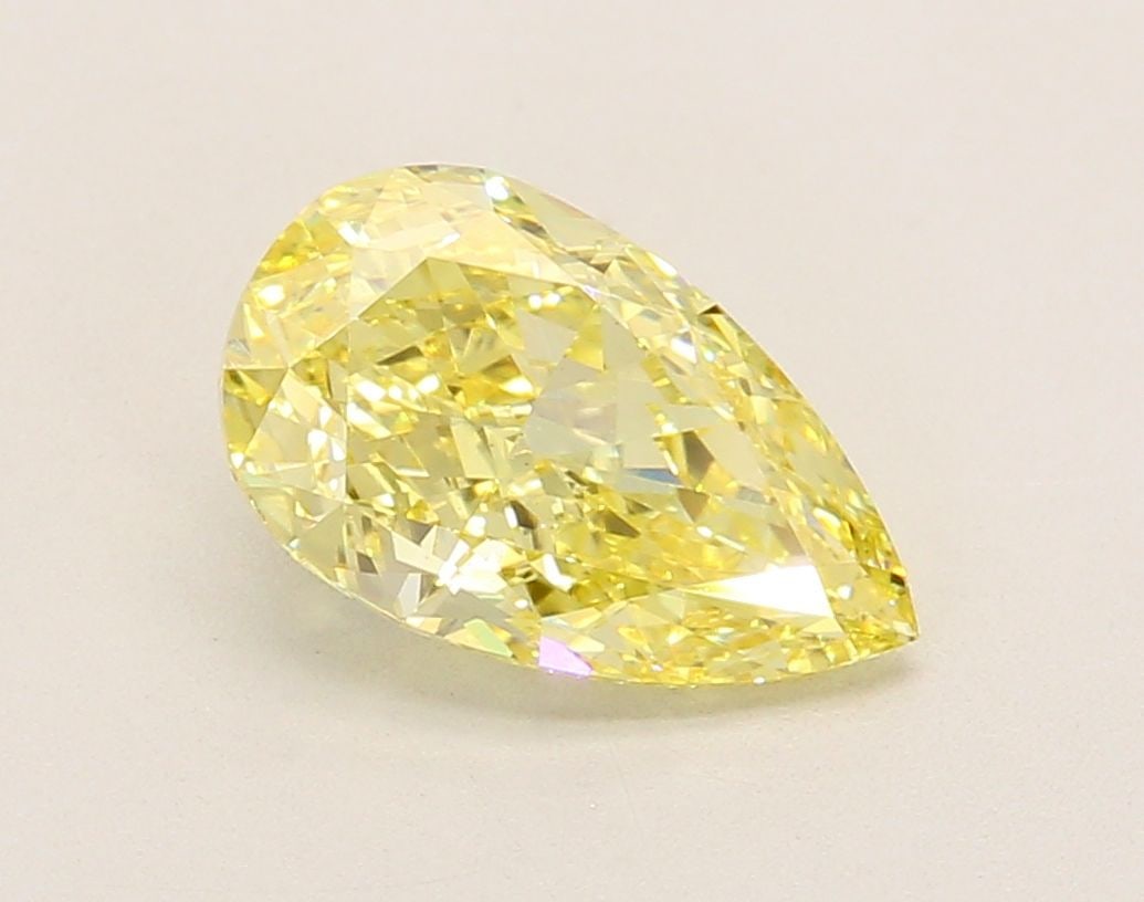 Loose Diamond - PEAR 2.11ct Fancy Intense Yellow VS1: Loose Diamond - PEAR 2.11ct Fancy Intense Yellow VS1 Source: This is a real non-mined Diamond that has been grown in a lab Shape: PEAR Carats: 2.11 Color: Fancy Intense Yellow Certification: IGI