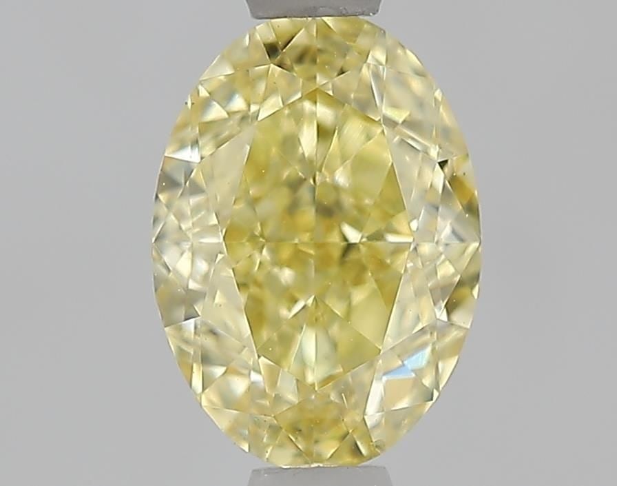 Loose Diamond - OVAL 1.09ct Fancy Yellow VS1: Loose Diamond - OVAL 1.09ct Fancy Yellow VS1 Source: This is a real non-mined Diamond that has been grown in a lab Shape: OVAL Carats: 1.09 Color: Fancy Yellow Certification: IGI Video: