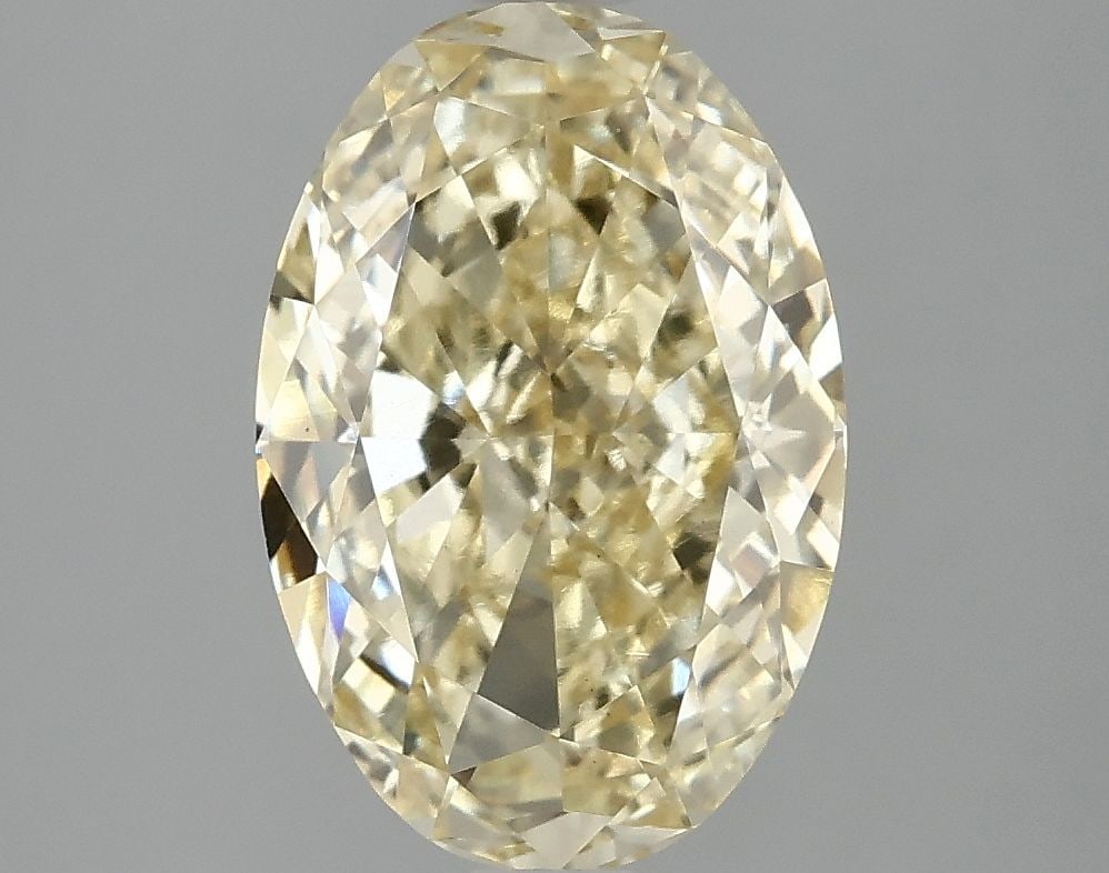 Loose Diamond - OVAL 4.02ct Fancy Vivid Yellow VS1: Loose Diamond - OVAL 4.02ct Fancy Vivid Yellow VS1 Source: This is a real non-mined Diamond that has been grown in a lab Shape: OVAL Carats: 4.02 Color: Fancy Vivid Yellow Certification: IGI Video: