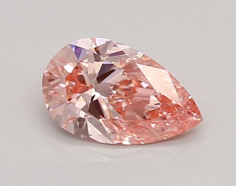 Loose Diamond - PEAR 0.9ct Fancy Vivid Pink VS1: Loose Diamond - PEAR 0.9ct Fancy Vivid Pink VS1 Source: This is a real non-mined Diamond that has been grown in a lab Shape: PEAR Carats: 0.9 Color: Fancy Vivid Pink Certification: IGI Video: